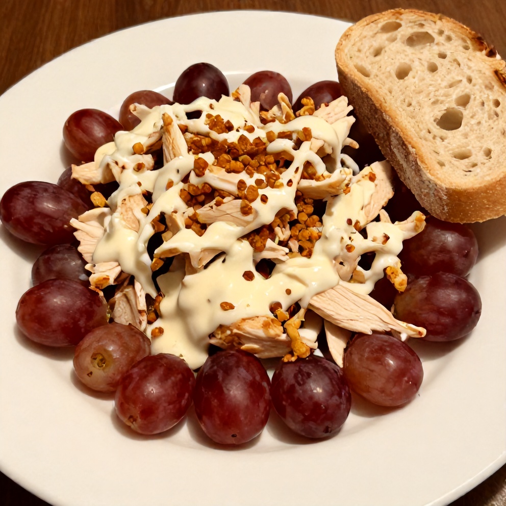 Easy Chicken Grape Salad plated with a side of bread