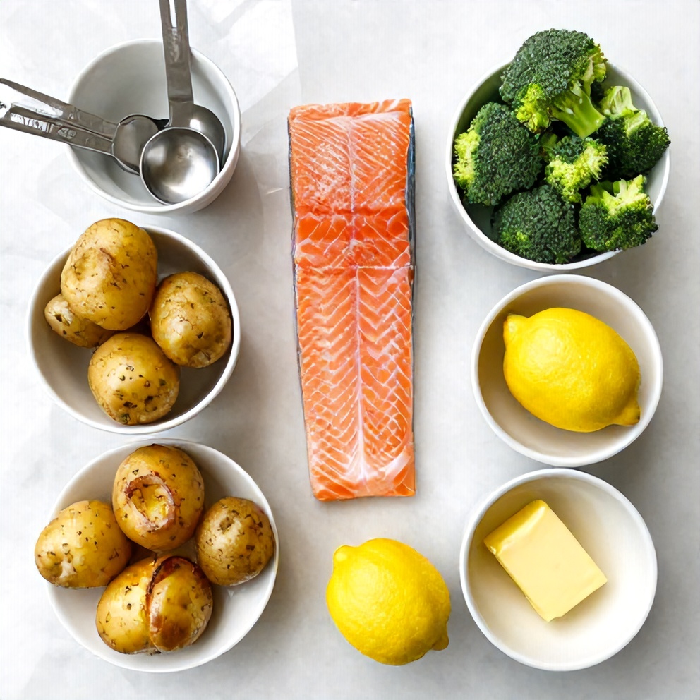 Raw ingredients for Easy Lemon Butter Salmon with Crispy Potatoes and Broccoli
