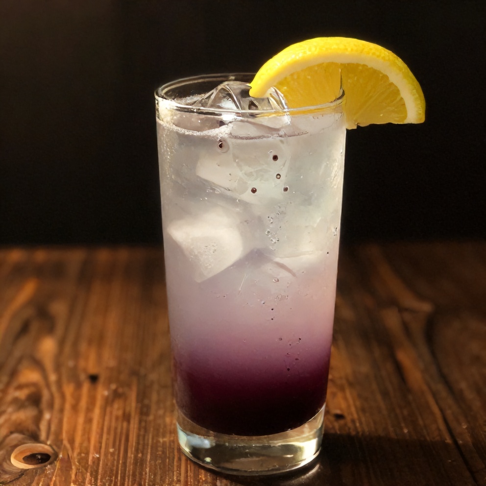 Fresh Sparkling Blueberry Lemonade Punch in a glass with ice and a lemon wheel garnish